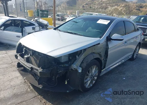 2015 Hyundai Sonata Limited z USA, uszkodzony, nr VIN 5NPE34AF2FH246695